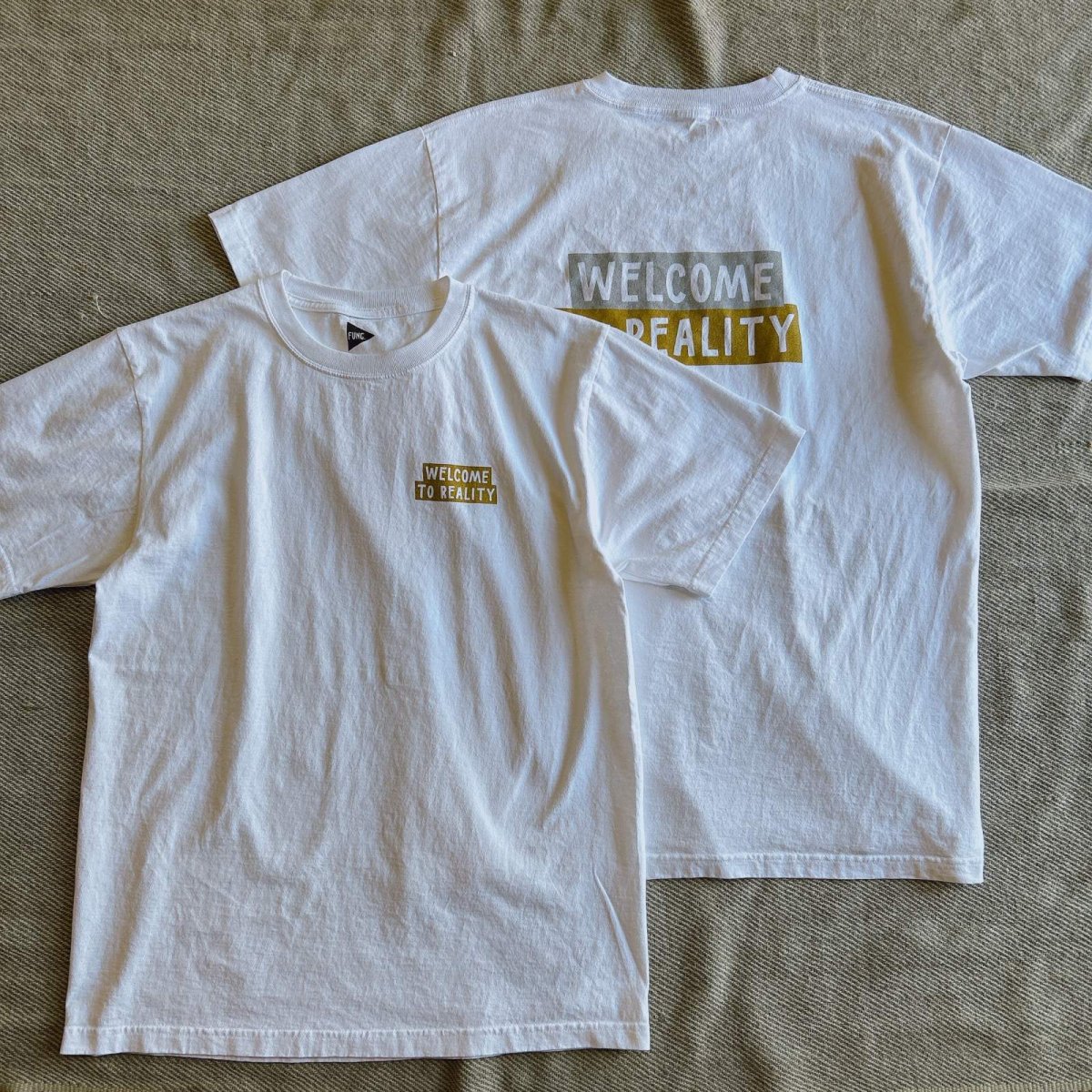 画像1: 【FUNG/ファング】半袖プリントTee "REALITY" (white)  (1)